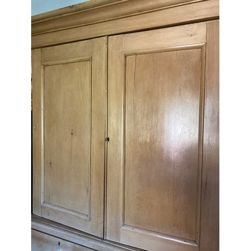 131 - A pine linen press, 125 max wide x 51 max deep x 213 max high.