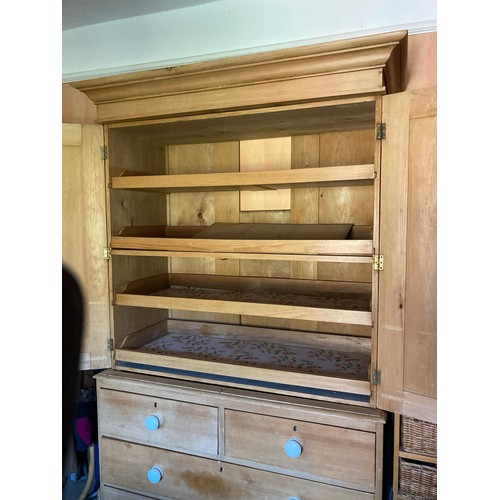 131 - A pine linen press, 125 max wide x 51 max deep x 213 max high.