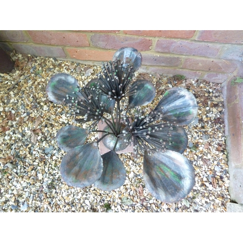 102 - A mixed metal sculpture of flowering plants with leaves