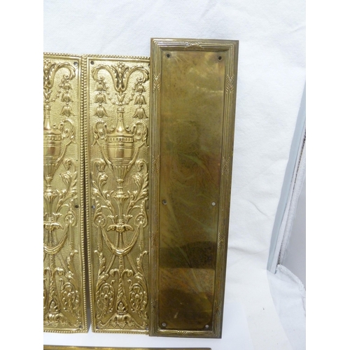 142 - Door Furniture - a pair of pressed brass finger plates decorated with neoclassical urns; a pair of f... 