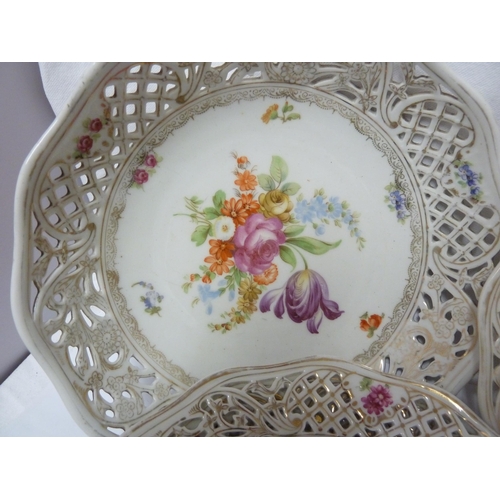 204 - A Schumann, Baveria porcelain dessert service, decorated with Summer flowers within pierced 'ribbon'... 