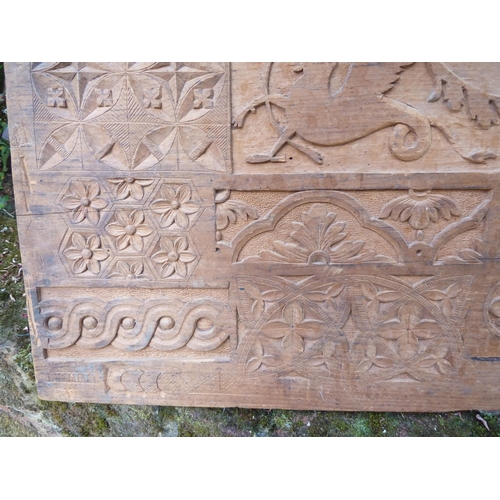 205 - A carving sampler, showing various forms of decorative motifs including a dragon, 40.5cm max