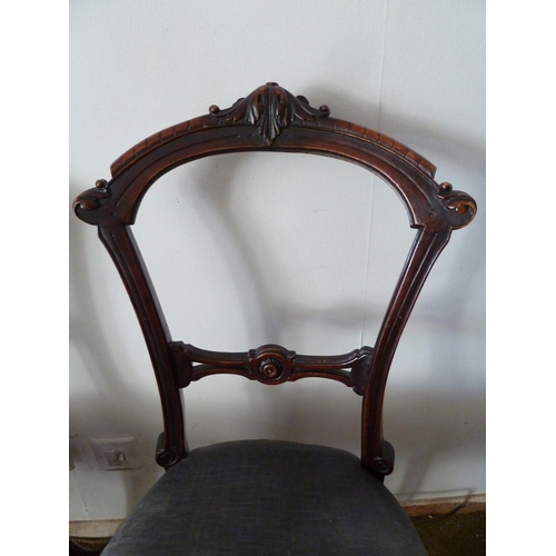 208 - A pair of Victorian mahogany bedroom chairs, bar back with foliate decoration to the top arch, taper... 