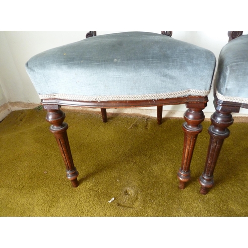 208 - A pair of Victorian mahogany bedroom chairs, bar back with foliate decoration to the top arch, taper... 