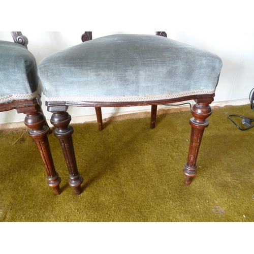 208 - A pair of Victorian mahogany bedroom chairs, bar back with foliate decoration to the top arch, taper... 