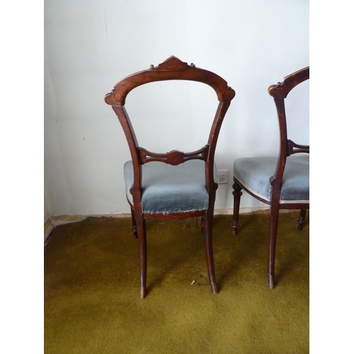 208 - A pair of Victorian mahogany bedroom chairs, bar back with foliate decoration to the top arch, taper... 