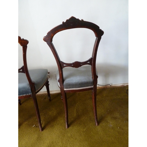 208 - A pair of Victorian mahogany bedroom chairs, bar back with foliate decoration to the top arch, taper... 