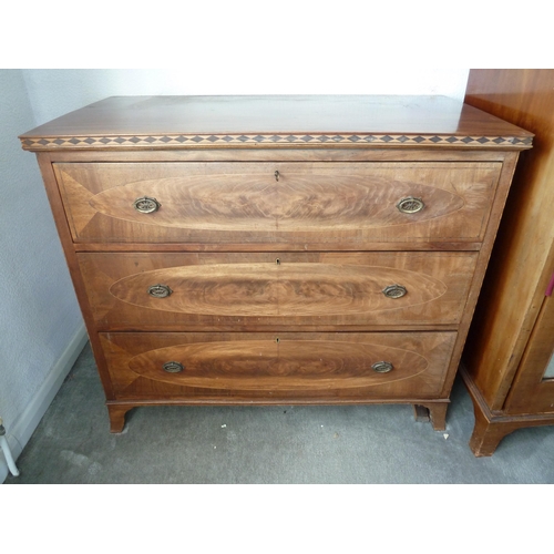 209 - Turner Woodward & Co Ltd, Manchester - a chest of drawers composed of three long drawers with oval r... 