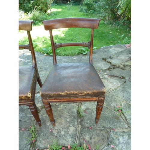 157 - A pair of Regency bar back side chairs, the bar bifurcated at each end forming a tight scroll, turne... 