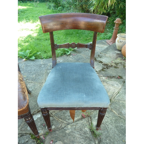 156 - A pair of Regency bar back side chairs bullseye motif to the center of the bar, reeded tapered legs ... 