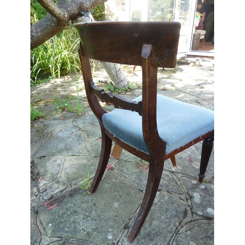 156 - A pair of Regency bar back side chairs bullseye motif to the center of the bar, reeded tapered legs ... 