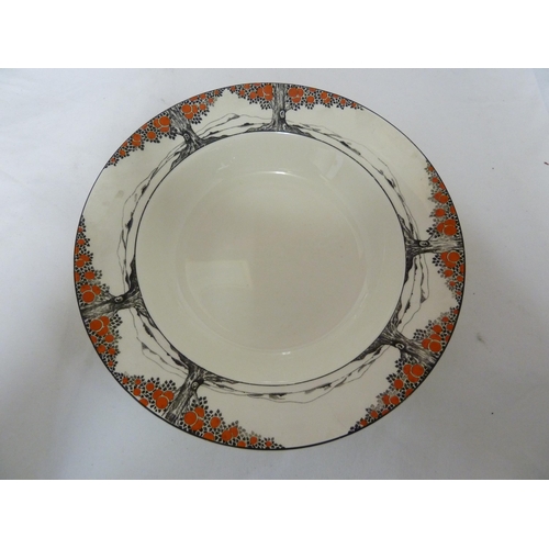 48 - A large Crown Ducal orange tree pattern meat plate; a round vegetable dish; and a shaped square vege... 