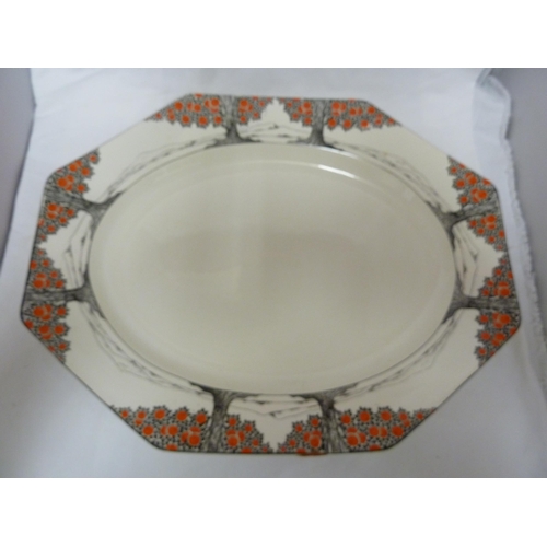 48 - A large Crown Ducal orange tree pattern meat plate; a round vegetable dish; and a shaped square vege... 