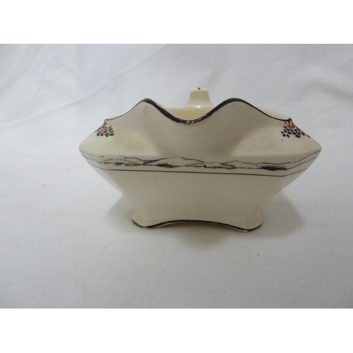 49 - A Crown Ducal Ware gravy boat; and three canted square vegetable tureens and covers 25.5cm max appro... 