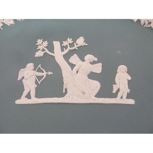 63 - A rare Wedgwood teal green jasper plaque, sprigged with Diana and Cupid before a truncated tree, a p... 