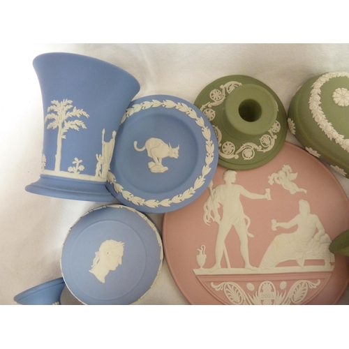 64 - Eleven items of Wedgwood jasper, comprising: a pink jasper circular plaque dated 2008; two bottle va... 