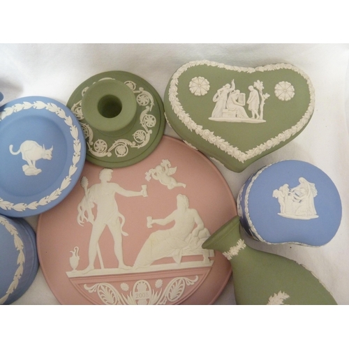 64 - Eleven items of Wedgwood jasper, comprising: a pink jasper circular plaque dated 2008; two bottle va... 