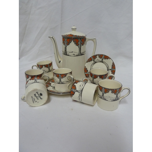 79 - A Crown Ducal Ware Orange Tree pattern coffee pot and cover; seven coffee cans; and five saucers, Re... 