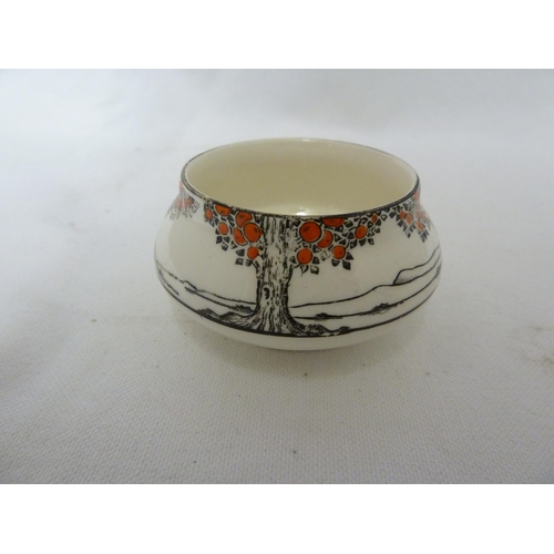 80 - A Crown Ducal Ware Orange Tree pattern preserve pot cover and integral stand; a tea plate fitted wit... 