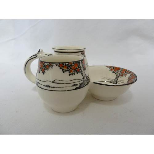 80 - A Crown Ducal Ware Orange Tree pattern preserve pot cover and integral stand; a tea plate fitted wit... 