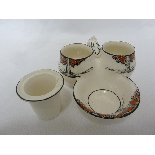 80 - A Crown Ducal Ware Orange Tree pattern preserve pot cover and integral stand; a tea plate fitted wit... 