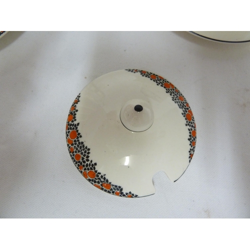 80 - A Crown Ducal Ware Orange Tree pattern preserve pot cover and integral stand; a tea plate fitted wit... 