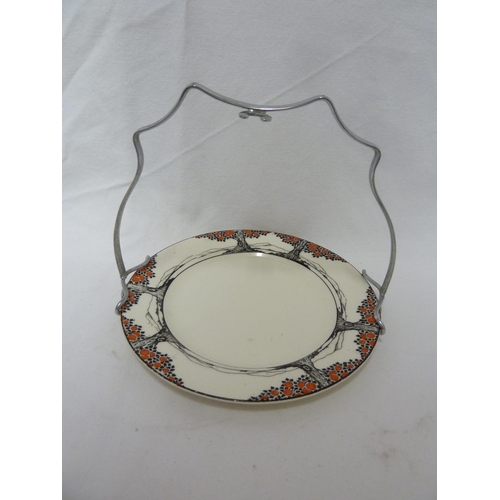 80 - A Crown Ducal Ware Orange Tree pattern preserve pot cover and integral stand; a tea plate fitted wit... 