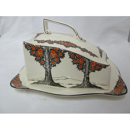 81 - A Crown Ducal Ware Orange Tree pattern cheese dish and cover; two egg stands; and fice egg cups, Reg... 