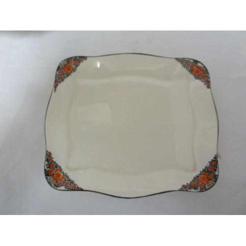 81 - A Crown Ducal Ware Orange Tree pattern cheese dish and cover; two egg stands; and fice egg cups, Reg... 