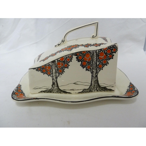 81 - A Crown Ducal Ware Orange Tree pattern cheese dish and cover; two egg stands; and fice egg cups, Reg... 