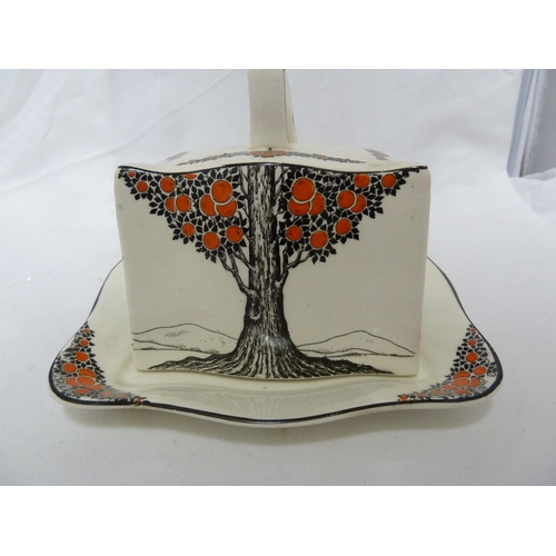 81 - A Crown Ducal Ware Orange Tree pattern cheese dish and cover; two egg stands; and fice egg cups, Reg... 