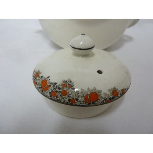 82 - A Crown Ducal Ware Orange tree pattern part tea set, comprising: Teapot, cover and stand; six cups, ... 