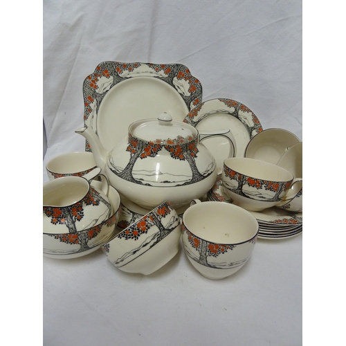 82 - A Crown Ducal Ware Orange tree pattern part tea set, comprising: Teapot, cover and stand; six cups, ... 