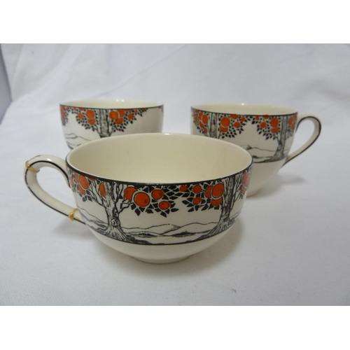 82 - A Crown Ducal Ware Orange tree pattern part tea set, comprising: Teapot, cover and stand; six cups, ... 