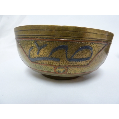 100 - A pair of Indian or Islamic brass temple bowls, richly chased and inlaid in white and copper metals ... 