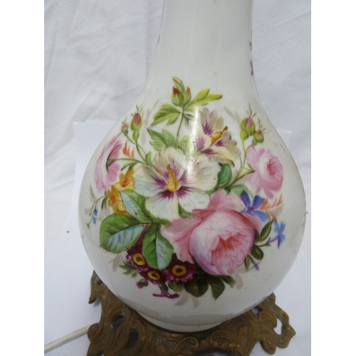 57 - A porcelain lamp base, of bottle form painted with bouquets of Summer flowers on a white ground, Fre... 