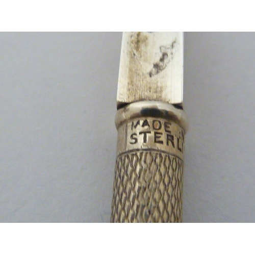 8 - A cased set of silver bridge pencils, marked Made in England and STERLING, in fitted box (5)