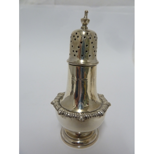 9 - A three piece silver cruet set, comprises pepperette, mustard and salt, the mustard and salt with fi... 