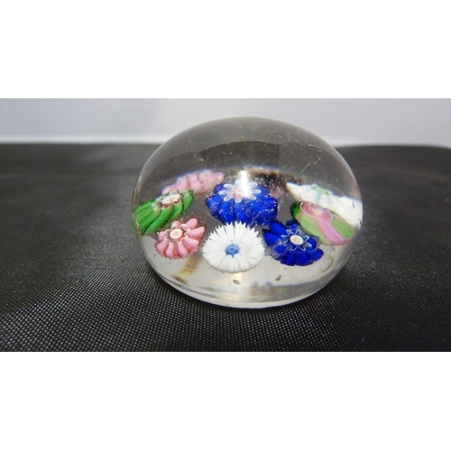 144 - A Clichy miniature glass paperweight, composed of 8 millefiori canes about a central cane, includes ... 