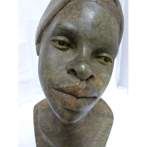 128 - A Harari verdite soapstone bust of an African woman, 33cm high approx