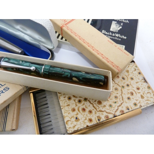 148 - A green, black and white marbled plastic fountain pen; a Golden Platignum pen box; a Parker fountain... 