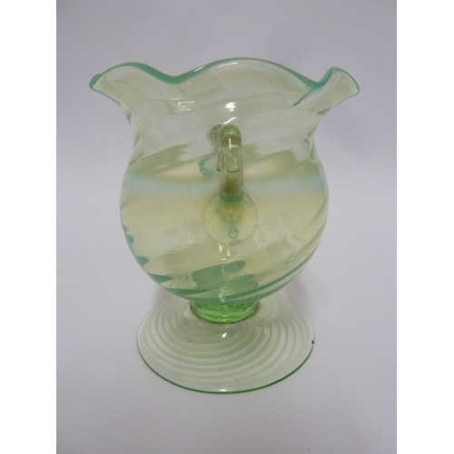 94 - A Stourbridge glass urn, of straw opal type with wrythen twist, 9.5cm high.