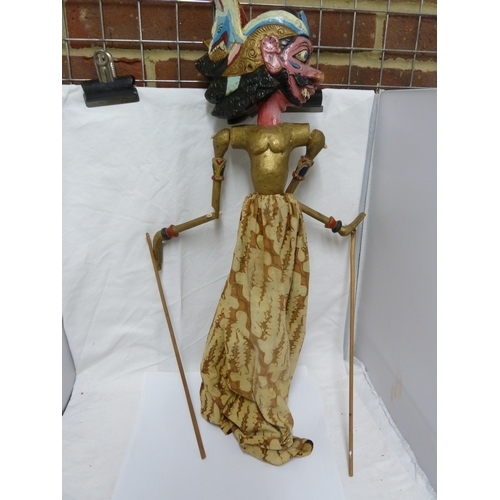 133 - An Indonesian Wayang Golek (rod puppet) figure of a man; and a large mask with rotating eyes (2)