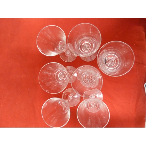 36 - Seven Dartington Sharon pattern glass flutes, acid etched Dartington mark to underside of each foot.... 