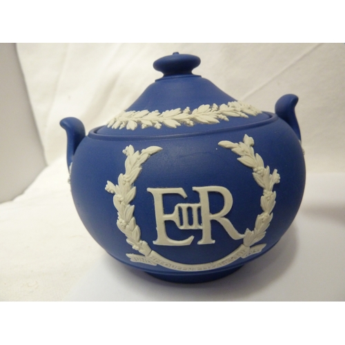 118 - A group of Wedgwood Jasper commemorative ware items, comprising: a Royal Blue Jasper teapot and cove... 