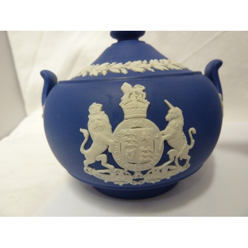 118 - A group of Wedgwood Jasper commemorative ware items, comprising: a Royal Blue Jasper teapot and cove... 