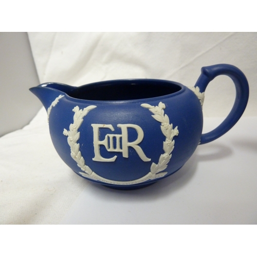 118 - A group of Wedgwood Jasper commemorative ware items, comprising: a Royal Blue Jasper teapot and cove... 