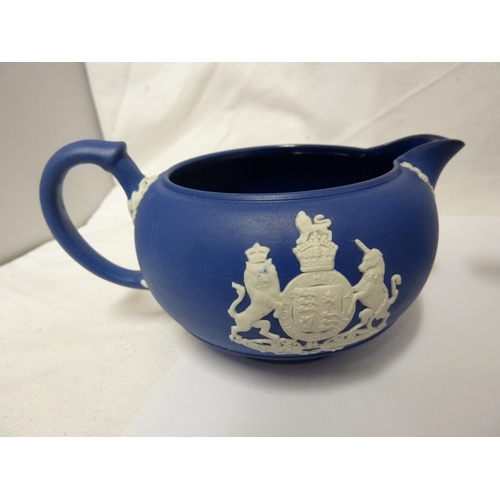 118 - A group of Wedgwood Jasper commemorative ware items, comprising: a Royal Blue Jasper teapot and cove... 