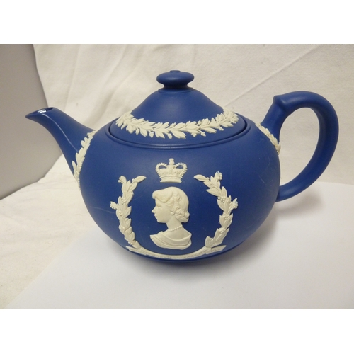 118 - A group of Wedgwood Jasper commemorative ware items, comprising: a Royal Blue Jasper teapot and cove... 