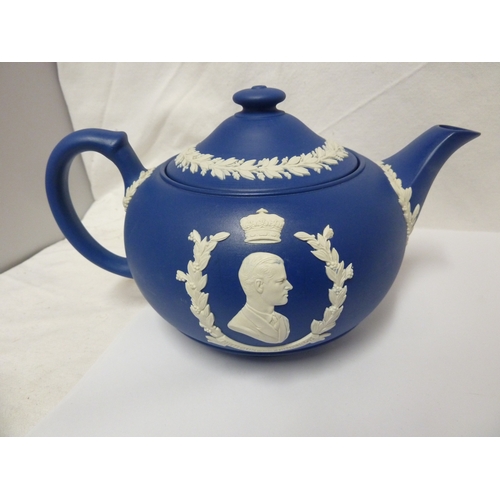 118 - A group of Wedgwood Jasper commemorative ware items, comprising: a Royal Blue Jasper teapot and cove... 